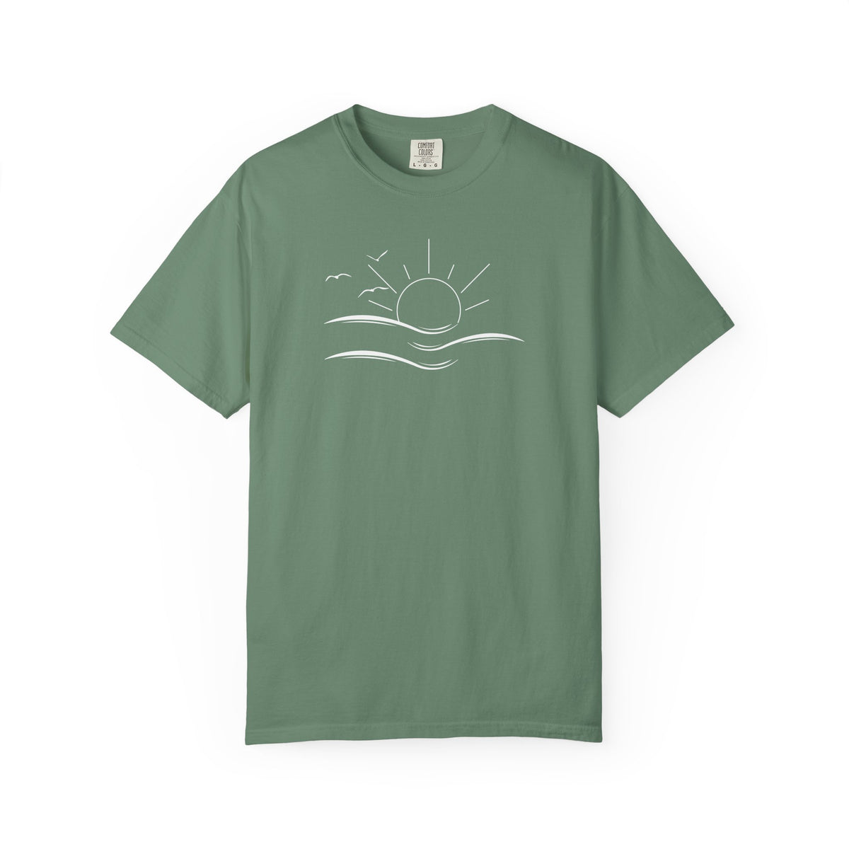 an oversized green t-shirt the image on the front is a simple line drawing of waves and a sun with birds flying around the sun.