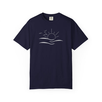 an oversized blue t-shirt the image on the front is a simple line drawing of waves and a sun with birds flying around the sun.