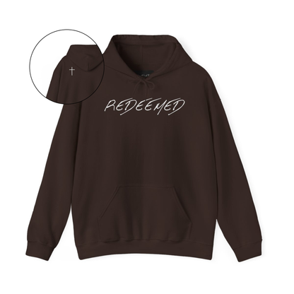 A brown hoodie with the words redeemed on the front center, a Jesus cross is on the back left shoulder of the hoodie.