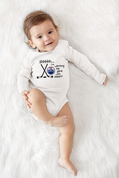 Customizable Shhh... I’m Watching the Game With DaddyHockey Infant Long Sleeve Onesie