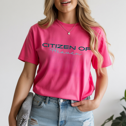 A pink t-shirt with the words Citizen of heaven in bright blue lettering 