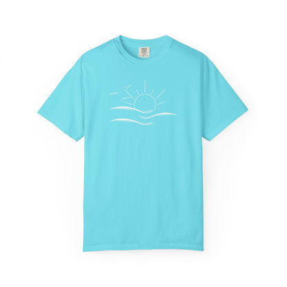 an oversized blue t-shirt the image on the front is a simple line drawing of waves and a sun with birds flying around the sun.