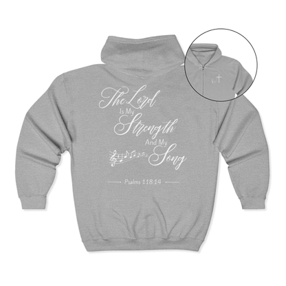 On the front of this Christian zip up hoodie is an image of a Jesus cross with music notes coming from the top of the cross, on the back of the hoodie are the words 'The Lord is my strength and my song Psalms 118:14 with music notes on either side of the image.