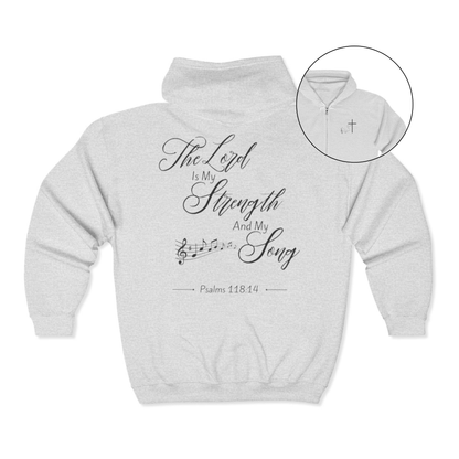 On the front of this Christian zip up hoodie is an image of a Jesus cross with music notes coming from the top of the cross, on the back of the hoodie are the words 'The Lord is my strength and my song Psalms 118:14 with music notes on either side of the image.