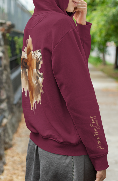 A Christian hoodie with the words Have No Fear Psalms 27:1 on the right sleeve cuff of the hoodie, there is a large image of a lion of the back of the hoodie 