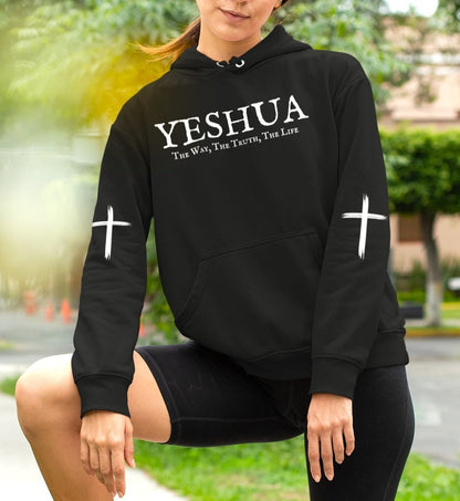 On the front of this Christian hoodie are the words 'Yeshua the way the truth the life' there is a Jesus cross on both sleeves of the hoodie.