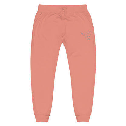 A pair of fleece lined mid rise skinny leg sweatpants with an embroidered silver dove carrying a fig leaf over the left front pocket of the pants.