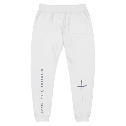 A pair of fleece lined sweatpants that have the words Stronger With Jesus on the back left leg of the pants, on the right leg is a large Jesus cross